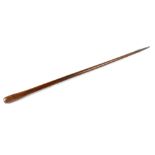 A teak military club stick with tapered metal tip, length 91cm.