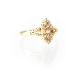 An 18ct yellow gold ladies' dress ring, marquise shape set with fourteen small diamonds, size P,