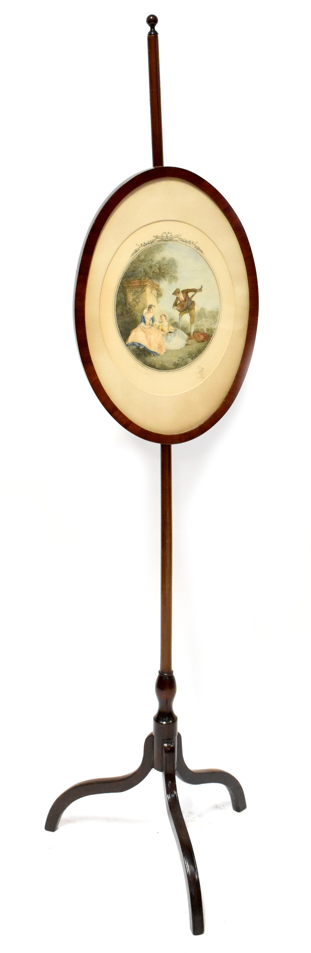 A 19th century mahogany adjustable pole screen with oval panel enclosing a hand coloured print,