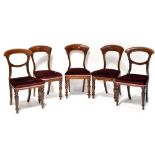 Three Victorian mahogany balloon-back dining chairs with overstuffed burgundy velour seats,