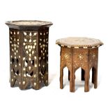 A Moorish hardwood bone inlaid octagonal occasional table, height 31cm and another similar,