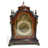 A 19th century tortoiseshell cased bracket clock with chiming movement, the brass face with three