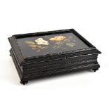 A 19th century Continental ebonised rectangular wooden box, the hinged lid inset with pietra dura