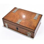 A late 19th century walnut storage box of rectangular form, with white metal mounts, length 19cm.