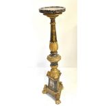 An unusual Italian late 18th/early 19th century gilt torchère with later marble dished top raised on