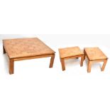 A pair of modern American parquetry low rectangular side tables, 69 x 53cm, and a coffee table (3).