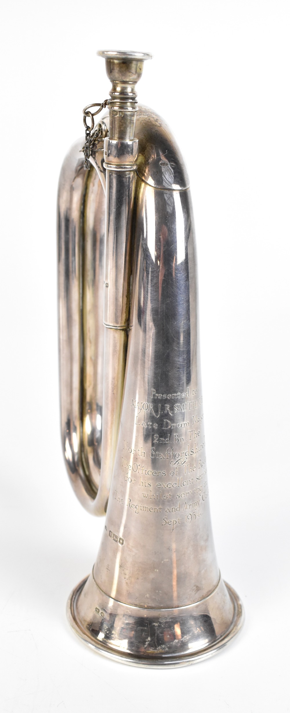 An unusual Elizabeth II hallmarked silver presentation bugle of typical form and size, inscribed '