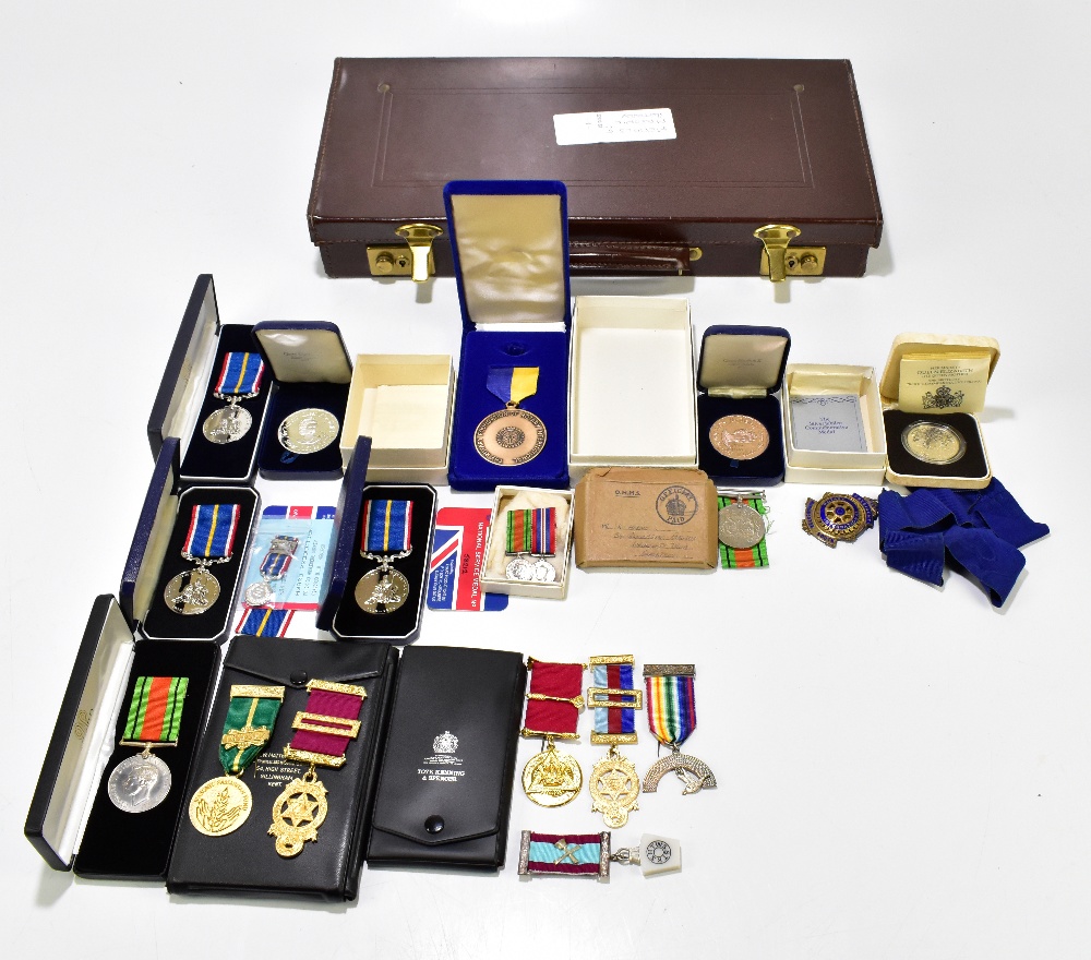 Two World War II Defence Medals, a set of miniatures, further medals to include three cased National