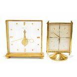 JAEGER-LECOULTRE; two 1960s/1970s brass cased eight day mantel clocks, height of each 16.5cm.