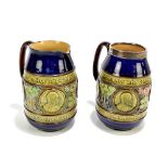 DOULTON LAMBETH; two Artware jugs with relief decoration commemorating the coronation of Their