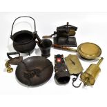 A collection of 19th century and later metalware including iron pestle and mortar, iron cauldron,