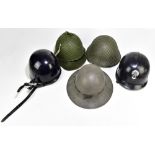 Five military and public service helmets comprising British Civil Defence Zuckerman, French