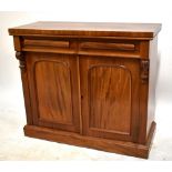 A Victorian mahogany chiffonier with two drawers and two panelled doors, raised on plinth base,