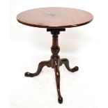 A George III mahogany tilt-top occasional table, the one piece top above birdcage action and