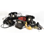 Four vintage bakelite telephones and a further later telephone (5) (af). Additional