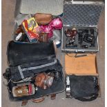 A large quantity of cameras and accessories including a Samoca, etc. Footnote: The cameras are all
