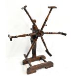 A late 19th century Welsh fruitwood wool winder, height 87cm. Additional InformationNumerous knocks,