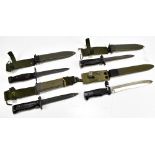 Three US M8 A1 bayonets and a Spanish Cetme 69 bayonet, all with scabbards (4).Additional