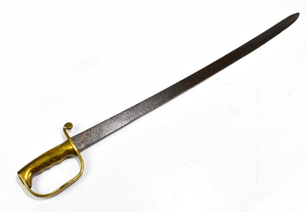 A hanger or cutlass with simple brass hilt, blade length 72.5cm.Additional InformationBlade