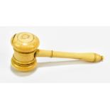 A Victorian carved ivory gavel, length 15cm.Additional InformationThere are large cracks throughout,