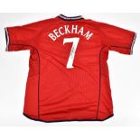 DAVID BECKHAM; an Umbro England 2002-2004 away shirt, signed to reverse with 'Beckham 7' printing,