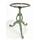 A painted tripod table base after a design by Thomas Chippendale, with later mahogany dished top