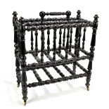 A Victorian ebonised bobbin two-division Canterbury, height 49cm, length 43cm.Additional