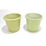 Two stoneware plant pots, each with ribbed bodies, height 19cm (2).