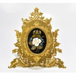 A 19th century gilt metal triptych photograph frame, with central inlaid pietra dura panel inside