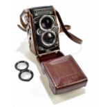 FRANKE & HEIDECKE; a Rolleiflex 2.8F twin lens camera no.2464966, the upper lens Heidosmat 1:2.8/