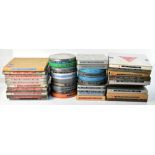 FILM/CINEMA & PROJECTION INTEREST; approximately forty 16mm and 9.5mm format film reels of mixed