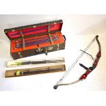 A Crusader Excalibur Pro Series bow in soft case, a hard case containing a selection of arrows.