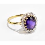 An 18ct yellow gold mounted diamond and amethyst set dress ring, size U, approx 5.5g. Additional