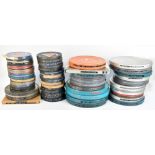 FILM/CINEMA & PROJECTION INTEREST; approximately fifty 16mm and 9.5mm format film reels of mixed