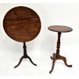 A Georgian mahogany tilt-top tripod table, height 75cm, diameter 63.5cm, together with a later