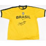 PELE (EDSON ARANTES DO MASCIMENTO); a signed Brazil Nike training shirt with further inscription '