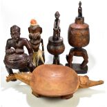 A collection of assorted tribal hardwood figures, lidded bowls, etc, including a model of a seated