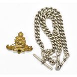 A hallmarked silver Albert chain with T-bar, overall length 41cm, approx 3.3ozt/103g, and a brass