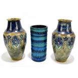 ROYAL DOULTON; a pair of vases decorated in relief with floral sprays, height 26cm, also an