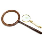 A Victorian mahogany picture gallery viewing glass, length 50cm, and a modern magnifying glass,