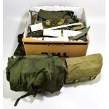 A collection of military rucksacks, haversacks, flask carriers and related accessories, various