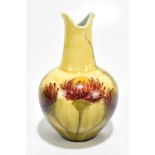 A Continental majolica glazed vase of bulbous form with flared neck, decorated with stylised detail,