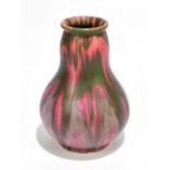 PAUL BOUDIN; a French art pottery vase of bulbous form, with splashed glaze, signed Paul F Boudin