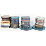 FILM/CINEMA & PROJECTION INTEREST; approximately forty 16mm and 9.5mm format film reels of mixed