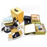 A collection of early 20th century and later microscopic slides, a contemporary microscope by