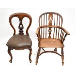 An 18th century elm seated low back Windsor armchair with crinoline stretcher, together with a