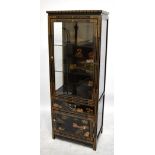 A reproduction Chinese lacquered display cabinet with chinoiserie decoration and single glazed