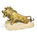 ROBERT BOUSQUET (1888-1917); a gilt bronze model of a stalking lion, signed to white stone base,