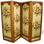 A pine framed four section room divider inset with floral materials on each panel, height 175cm.