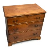 A 19th century mahogany chest of three drawers, with brass swan neck handles, raised on bracket